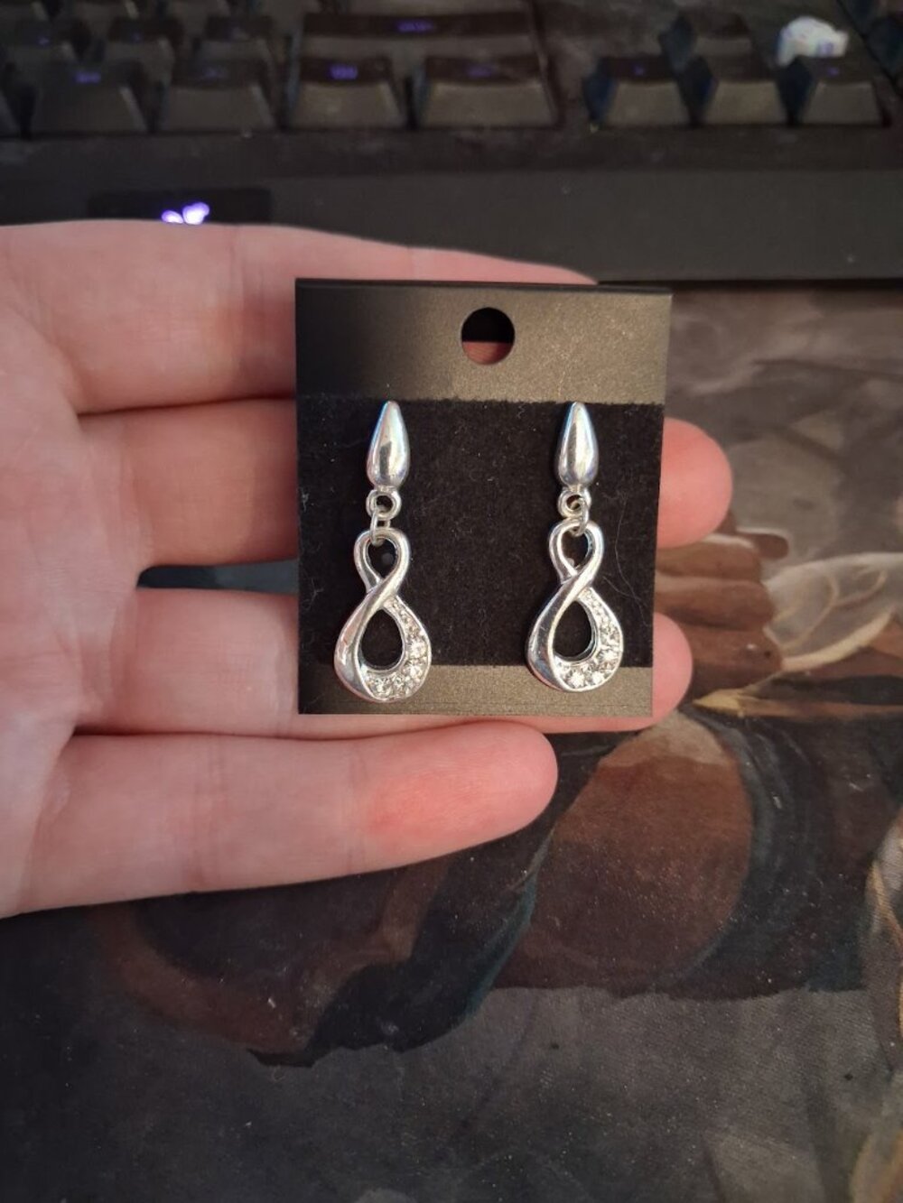 Infinity loop dangle earrings